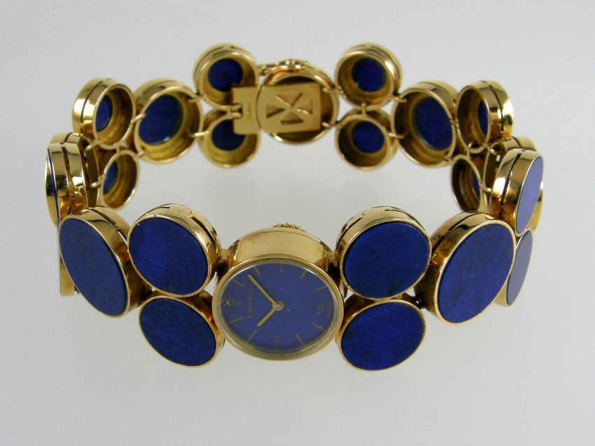Amazing Cartier watch in 18k and Lapis with a Lapis dial.  It is a manual wind, backwind.
