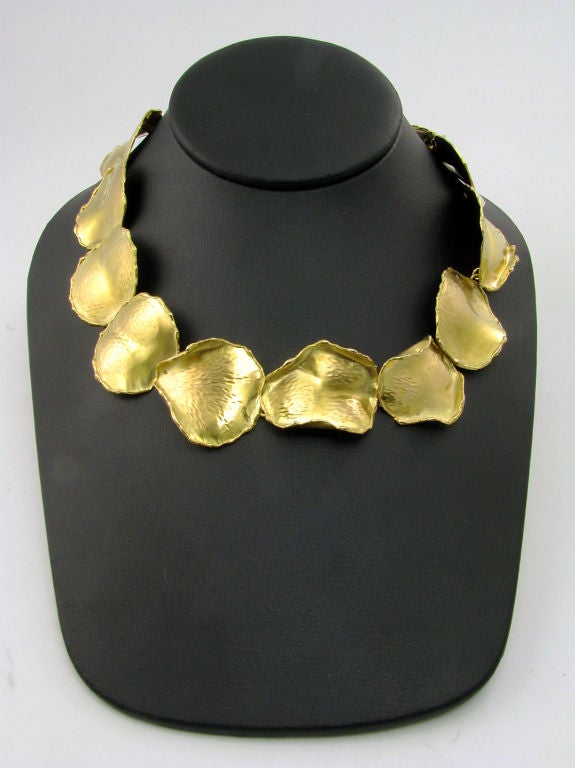 An 18 karat yellow gold necklace designed as connected rose petals.  Angela Cummings for Tiffany