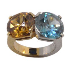 Blue and orange zircon ring