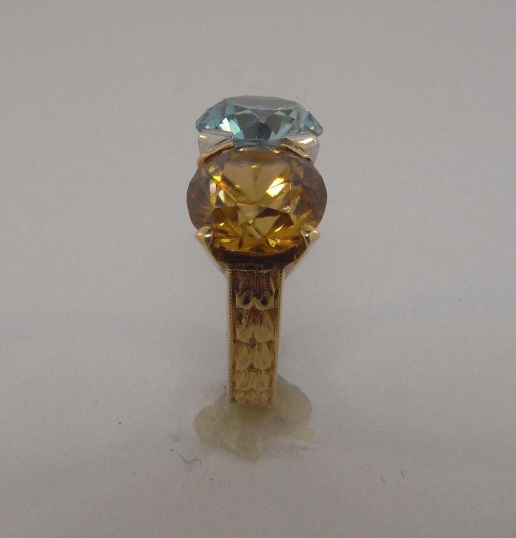 Blue and orange zircon ring