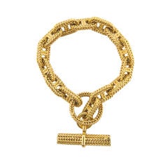 An Hermes gold link bracelet
