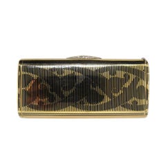 Gold and enamel cigarette box by Cartier New York