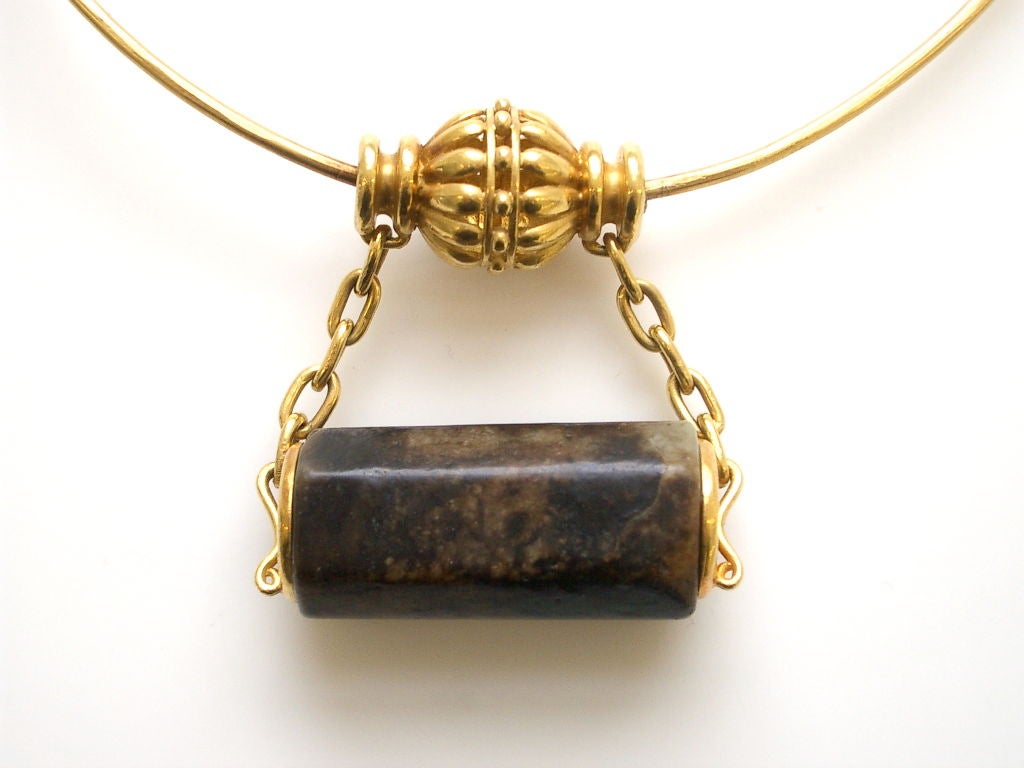 A rare 22k yellow gold and jade necklace by Helen Woodhull. <br />
The 15 1/4