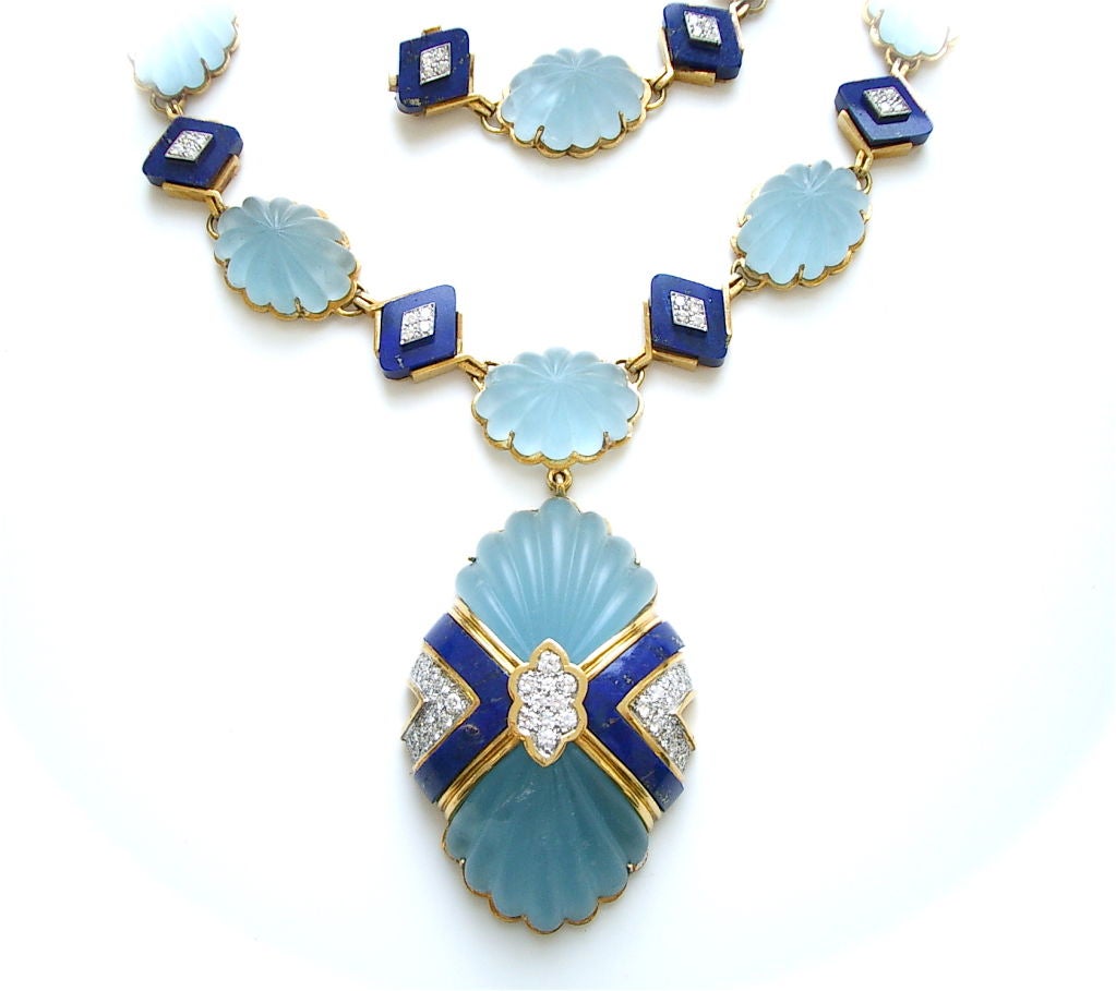 A stunning 18k yellow gold, aquamarine, lapis lazuli,and diamond necklace by Wander. The 28