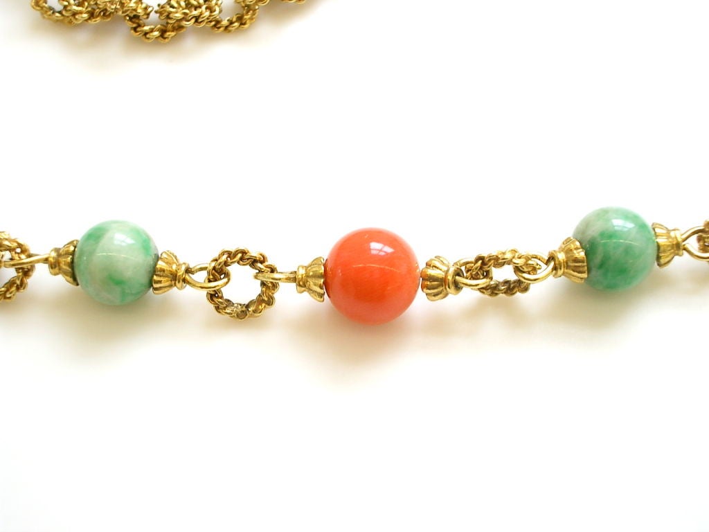 A pretty 18k yellow gold, coral and jadeite longchain. The 30
