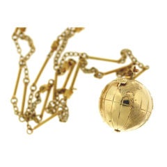 Fabulous Golden Globe pendant on Long Chain