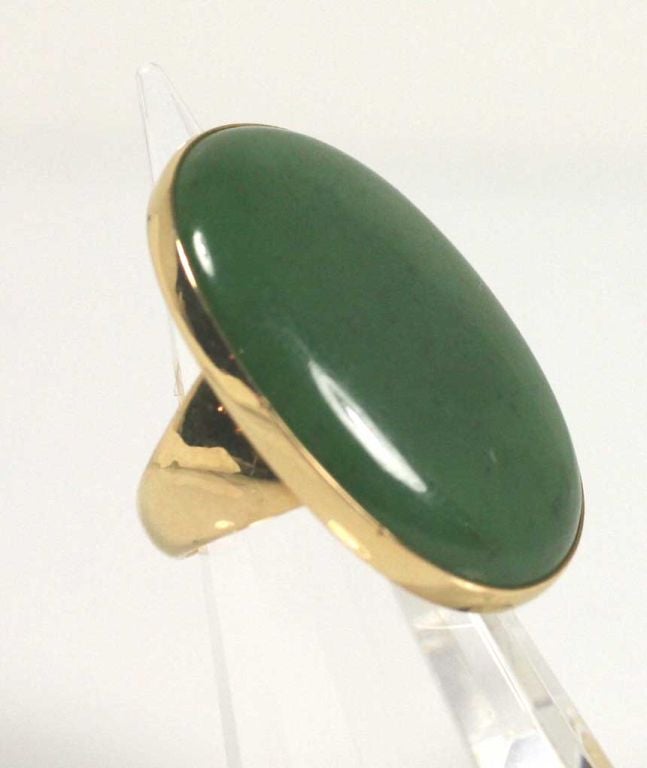 Georg Jensen 18 karat gold with nephrite jade ring No. 1090. Designed by Soren Georg Jensen circa 1960's. Ring is size 4.5 (can be sized) and bears impressed company marks.