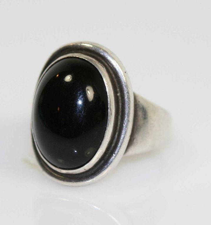 Georg Jensen sterling silver and onyx ring No.46A. Originally designed by Harald Nielsen circa 1920's. Ring is size 7 (can be sized) and bears impressed company marks.