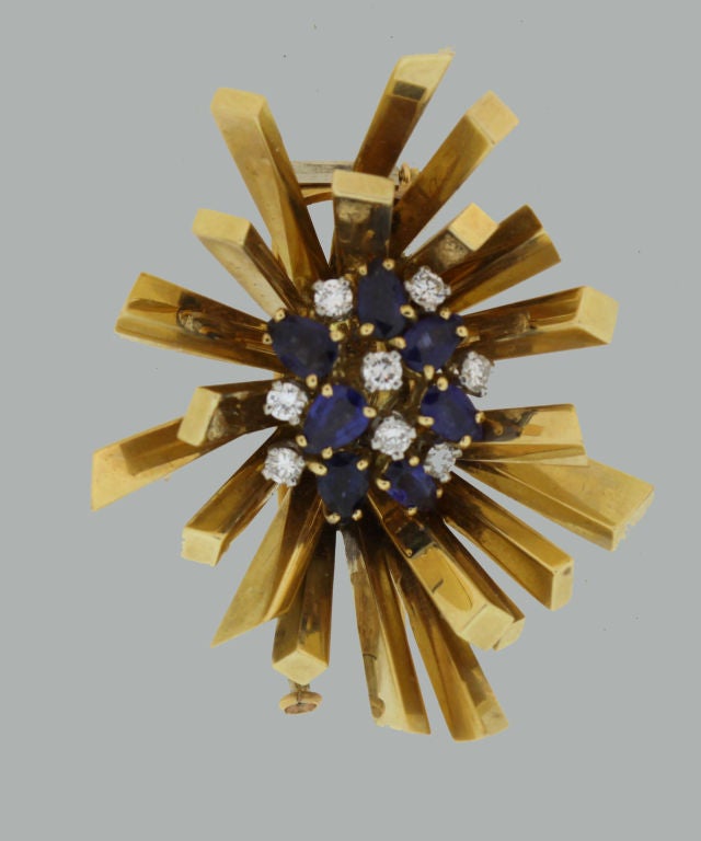 Retro Gold and Sapphire Starburst Pin by MELLERIO Paris