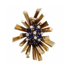 Vintage Gold and Sapphire Starburst Pin by MELLERIO Paris