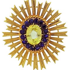 SEAMAN SCHEPPS Medallion Brooch of Golden and Blue Sapphires