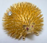 A 14 Karat Yellow Gold, Ruby & Diamond Hedgehog Pendant