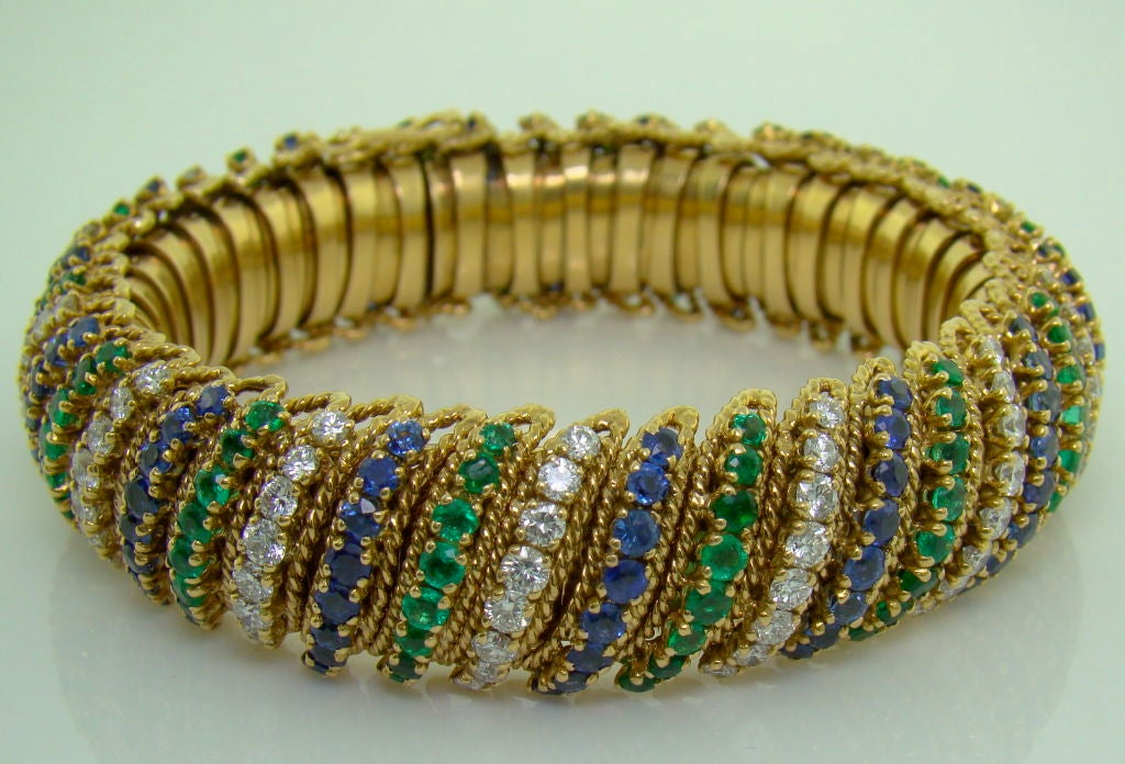 An 18K Yellow Gold, Diamond, Emerald & Sapphire Bracelet by Van Cleef & Arpels - circa 1954