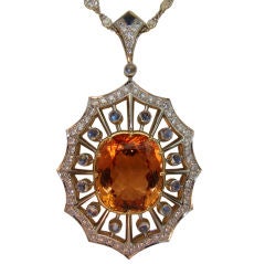 Imperial Topaz, Moonstone, & Diamond Pendant in Platinum 12