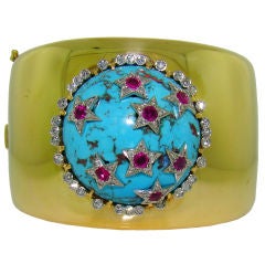 Bracelet en or jaune 18 carats, turquoises, rubis et diamants