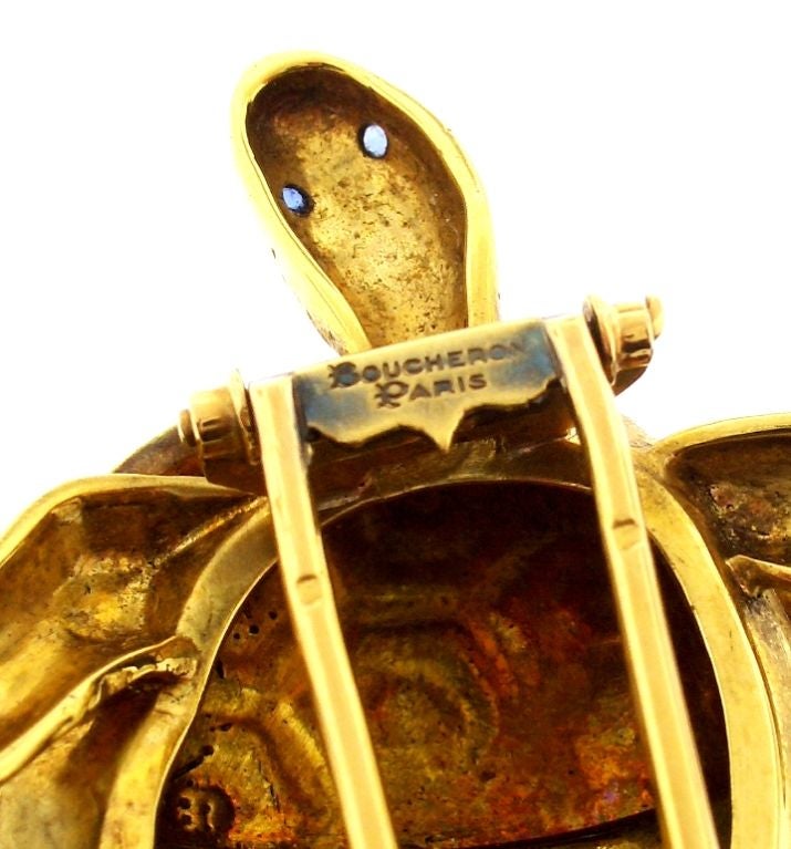 A green  enameled 18K yellow gold turtle pin set with sapphires. Signed Boucheron. French , C1960