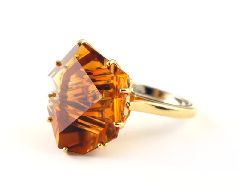 18KT gold and Munsteiner cut citrine ring.   Citrine is carved by famous German stone cutter Bernd Munsteiner.  Simple, elegant setting designed and made by Julius Cohen.