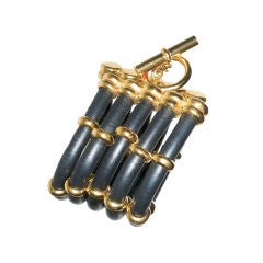 Unusual 1979 Chanel Rubber and Gilt Metal Bracelet
