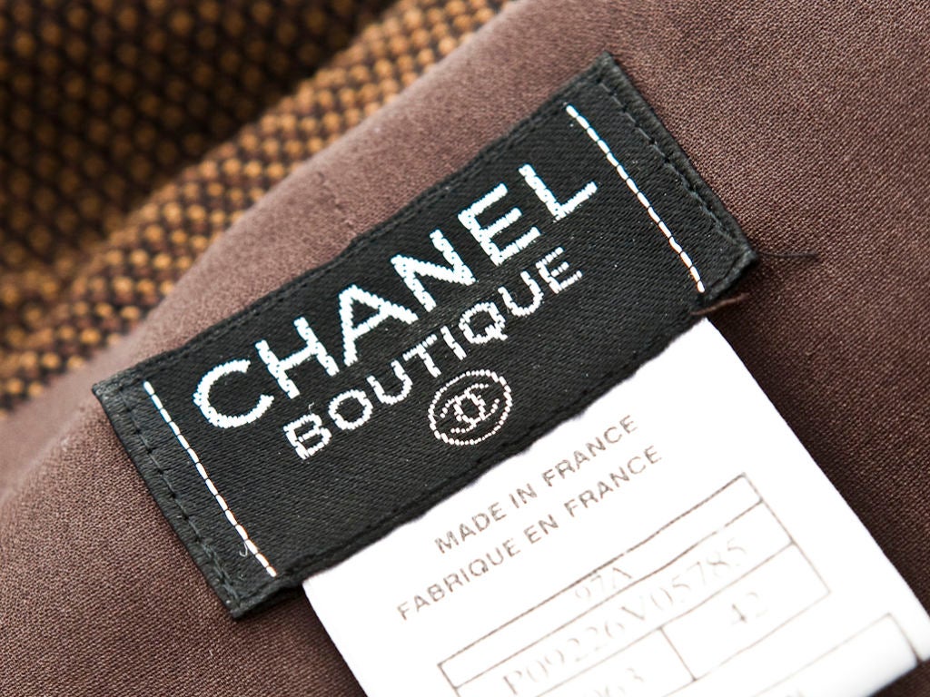 Women's Chanel brown + black tweed jumpsuit