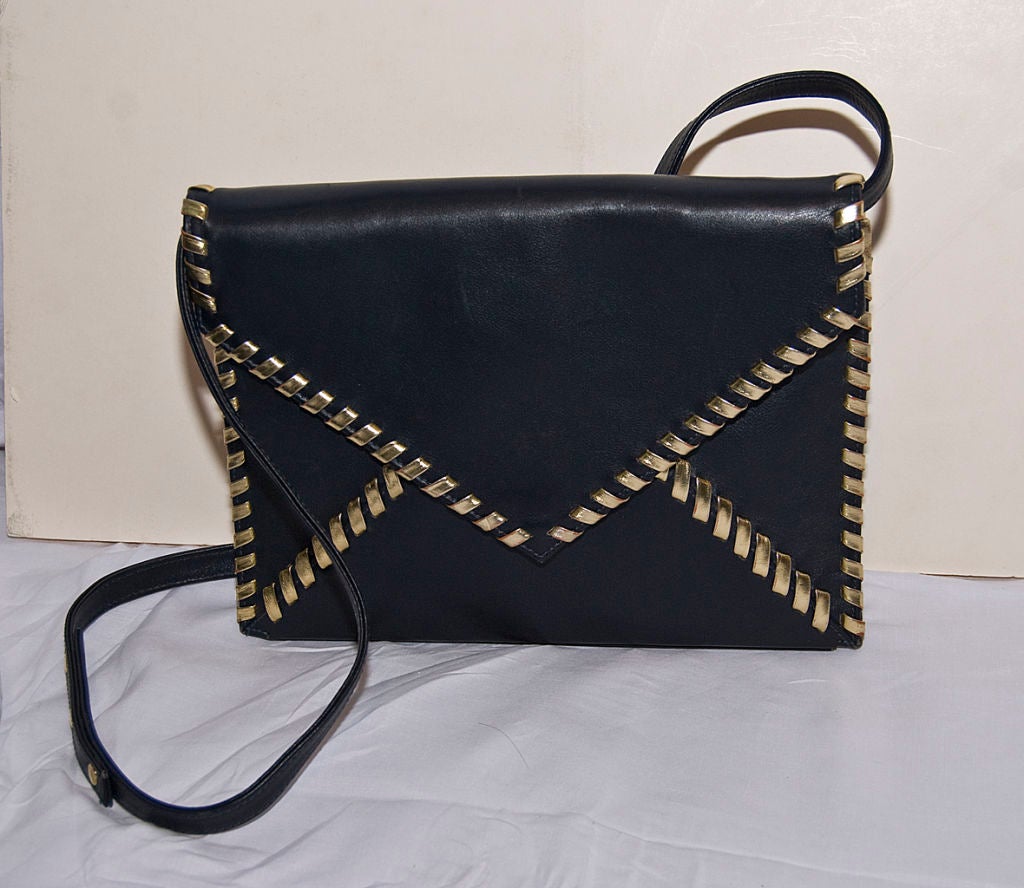 Women's Yves St. Laurent blue + gold leather envelope clutch