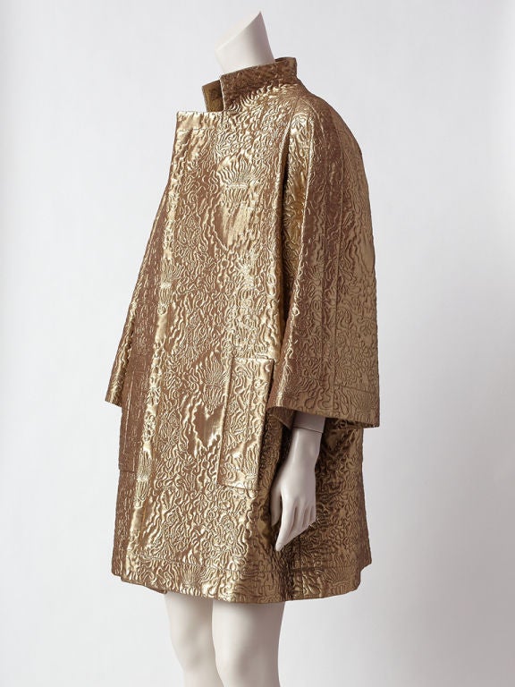 Christian Lacroix, lame quilted evening coat. This coat has a beautiful bronze - gold tone. Stand -up exaggerated  mandarin collar and wide 
