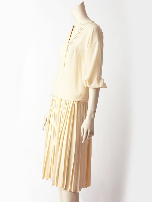 karl Lagerfeld for Chloe ivory silk 2 piece ensemble consisting of a collarless blouson top with a pleated yoke and a pleated skirt.