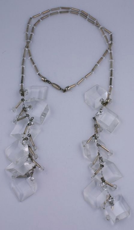 Fun 1960's lariat of lucite ice cubes,crystal and chrome bugle beads to be scarf tied in various configurations.A second identical necklace is available for additional drama.<br />
Total Length: 40"  <br />
Cubes are 1" wide<br />
Cube