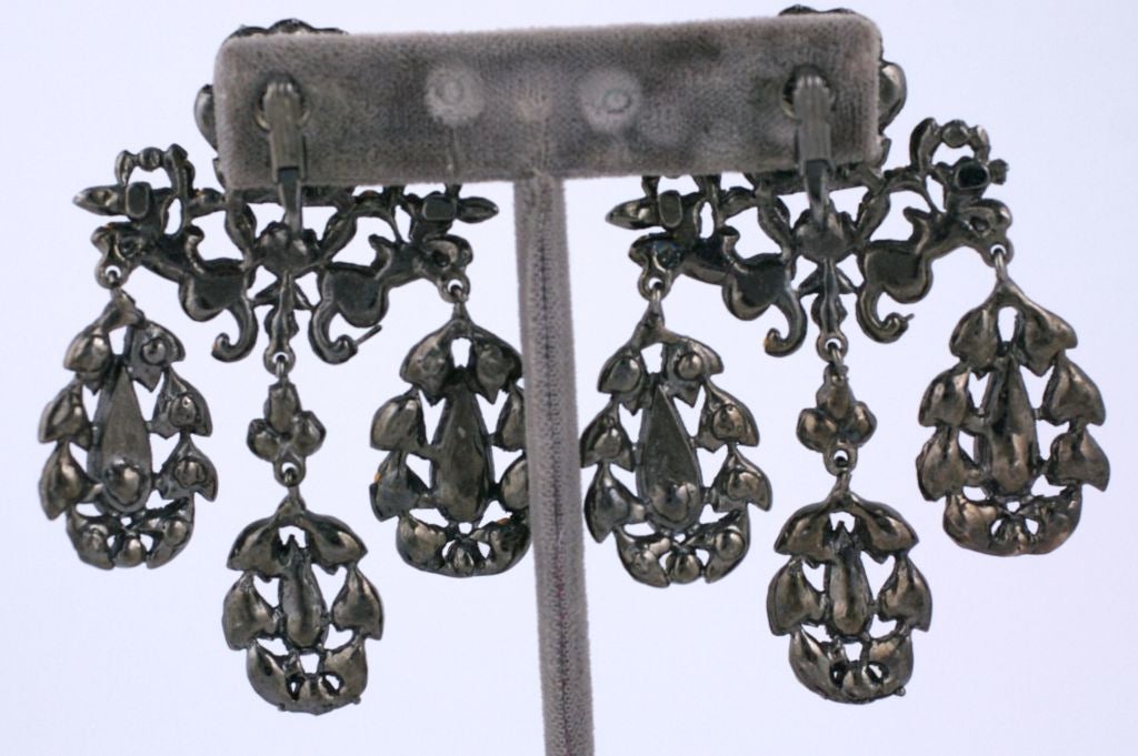 Antique style 18th Century Girandole earring from the estate of fashion icon D.D. Ryan. Blackened metal and crystal pastes with clip backs. Statement earrings with provenance...in the style of Kenneth Lane.

Width: 2.25