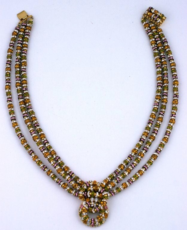 Lovely necklace from the 1950-60s comprised entirely of pave colored rondels in pale pink, citrine, olivine, and crystal. Extremely sparkly and festive. Italian Origin.<br />
15