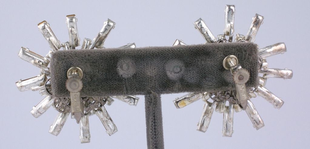 Large Miriam Haskell baguette sputnik earrings with adjustable clip back. Goodlooking and impressive in scale. 1980s USA.
1.75" width  Clip back w adjuster.