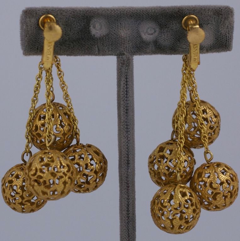 Miriam Haskell signature russian gold plated earrings. Four filigree pierced balls (.5