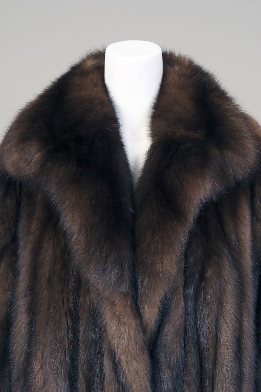 Chic stylish and generously sized this exquisite Russian sable coat from the prestigious New York furrier Alixandre is ready to keep you warm all winter long.  Nothing is warmer than light weight sable!<br />
Traditional design never goes out of