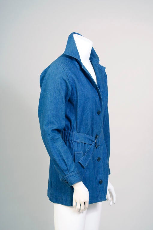 The former owner purchased this Yves St Laurent jacket in Paris in the 1970's, at the height of the denim craze.  It is ever so much more stylish than a Levis jean jacket, but just as versatile.<br />
Round metal buttons are used on the front of