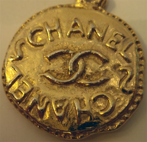 Chanel Gold Coin Logo Earrings, Circa 1980