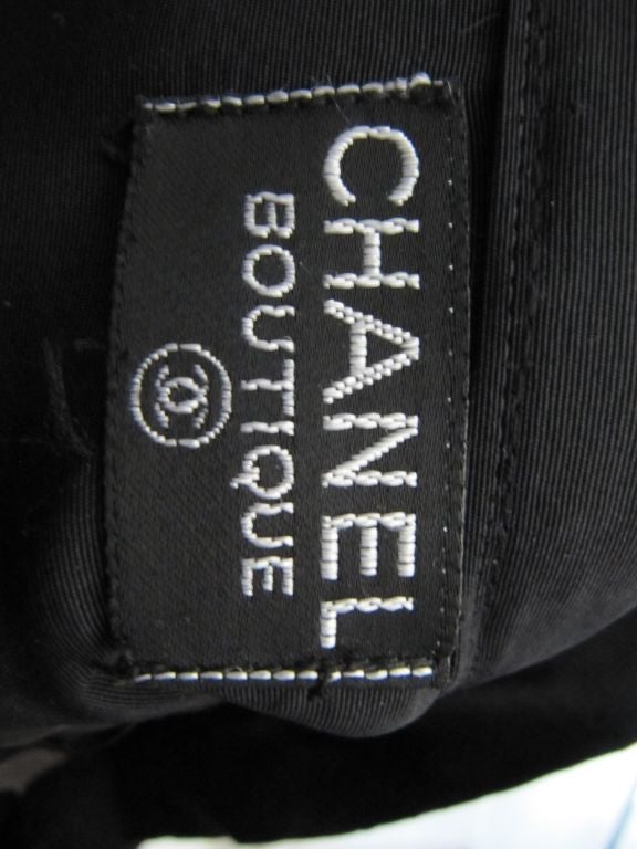 This is a long black pleated ball skirt by Chanel, from the 1980's. <br />
It measures to be a 32 “ waist. <br />
The length is 40 