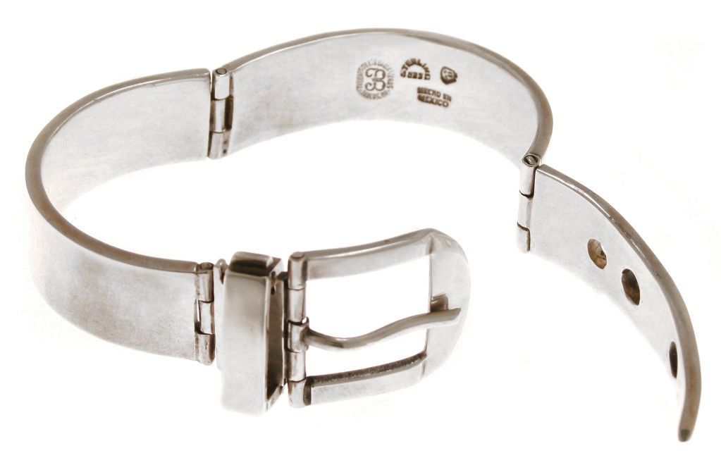 This is a great looking bracelet by Los Ballesteros.  It is substantial in weight and has a good feel. The interior measures 2 3/8
