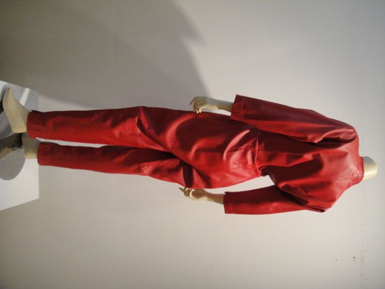 Tough 1980's Red Leather Vicky Tiel Zip-up jumpsuit will take you from the Harley to the club in uber 80's style!!
