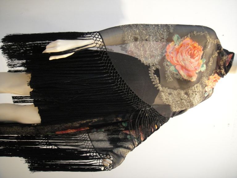 This 1920's floral print silk chiffon with black background and gold metal lame figures has 14