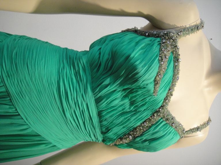 This Saks Fifth Avenue 60s Beaded Jade Chiffon Cocktail Dress is incredibly detailed with hand ruched silk, beading at the neckline and a lovely drop-waist silhouette!