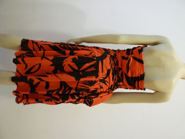 Vicky Tiel 80s graphic strapless, ruched bodice sarong-style dress is titled 
