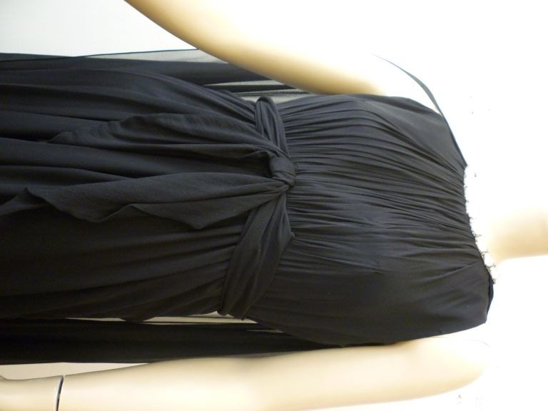 Fabulous 1960s Lillie Rubin black chiffon goddess gown with jeweled neckline and empire tie front detail.  Silk chiffon column with added silk chiffon 