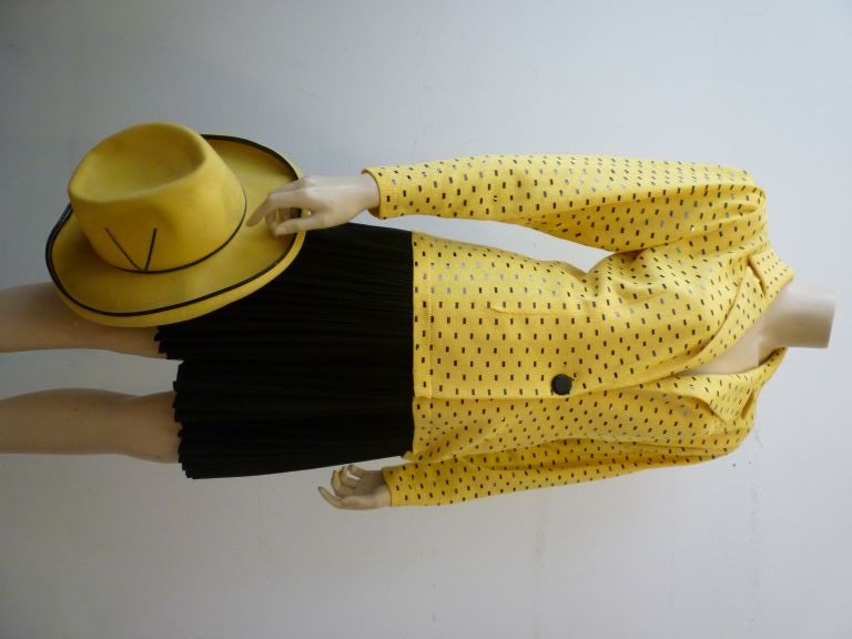 This 1980s St. John by Marie Gray glitters with rectangular shaped heat fused spangles and has great shoulder detail and single button style!  <br />
<br />
Paired with a Montana pleated wool mini skirt and Adolfo II yellow felt hat with black