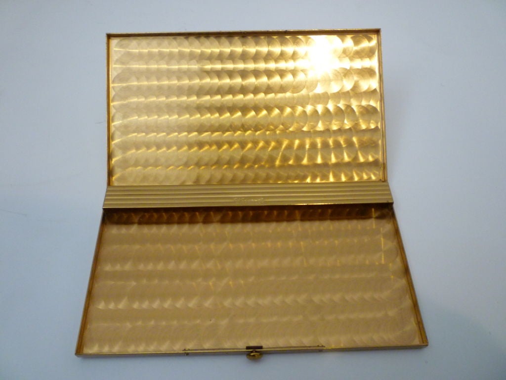 Wonderfully kitschy 1950s cigarette case by Wadsworth.  Features a complete map of the USA in gold and silver finish on the front, the inside is decoratively brushed and the back is sweetly engraved 