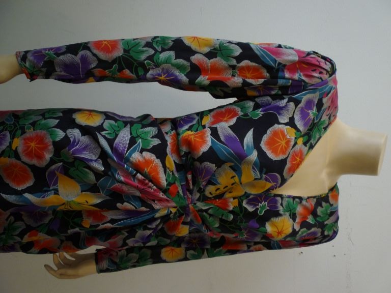 Ungaro 1980s silk floral print cocktail dress with front gather bodice, zip up sleeve and silk chiffon lining.  <br />
<br />
No Italian size marking, but fits a US size 6.  Originally sold at Neiman-Marcus.