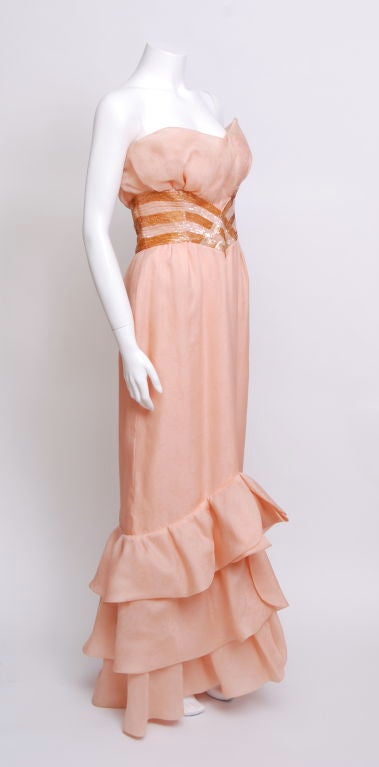 Floor length peach gown with peach and gold bugle beaded empire waistline.