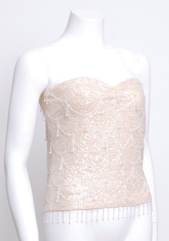 Cream colored wool/cashmere blend embellished strapless sweater blouse, adorned with clear sequins and glass beadwork and 1