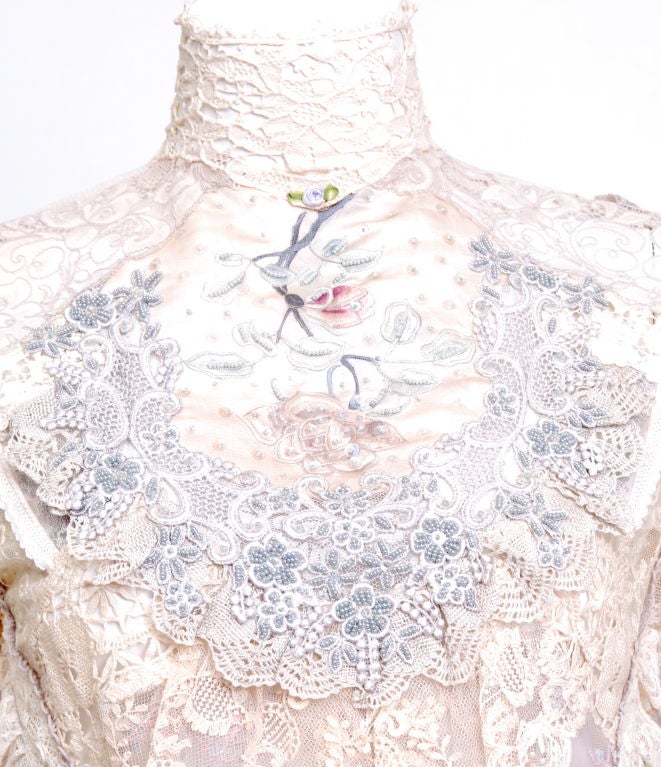 June had a tailor rework this Victorian era blouse to her suit her personal taste. Lace applique with pearl beading. Waist gathers with ribbon at bottom. 

June Carter was a distinguished singer, songwriter, author, actress, comedian, and