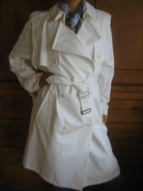 Fabulous Classic White Trench Coat from HERMES<br />
<br />
This is to sweet, New with Tags, the buttons are removable, and can be switched to button on the men's side, or womens<br />
<br />
This fabulous coat is made of fabulous 100% cotton in