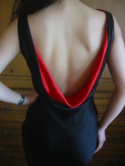 Sexy Open Back Silk Gown from ALEXANDER McQUEEN<br />
<br />
This is absolutely beautiful<br />
<br />
This gorgeous gown is made of luxurious silk in a classic shade of black.<br />
 <br />
Made with a sexy body hugging fit and lovely