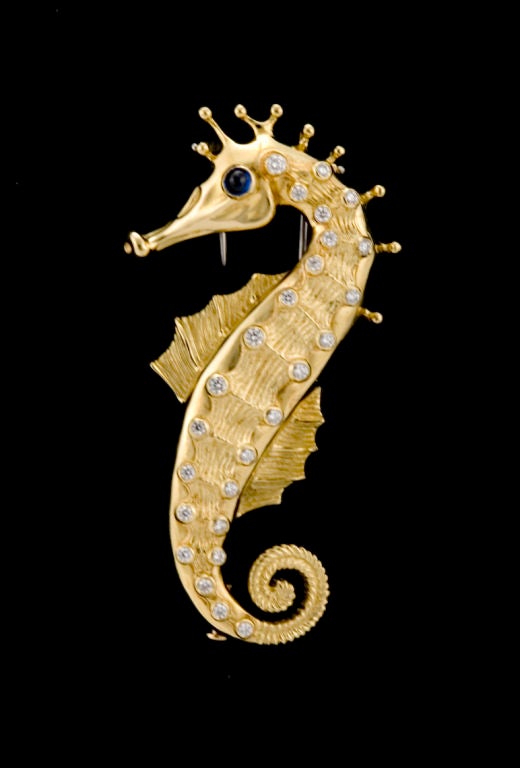 PLEASE VISIT LAUREN STANLEY IN NEW YORK,<br />
<br />
A fine 18 karat gold, sapphire and diamond brooch - pin - one-of-two-made - by Albert Lipten, of New York in the form of a seahorse, with exquisitely crafted diamonds running down the seahorse